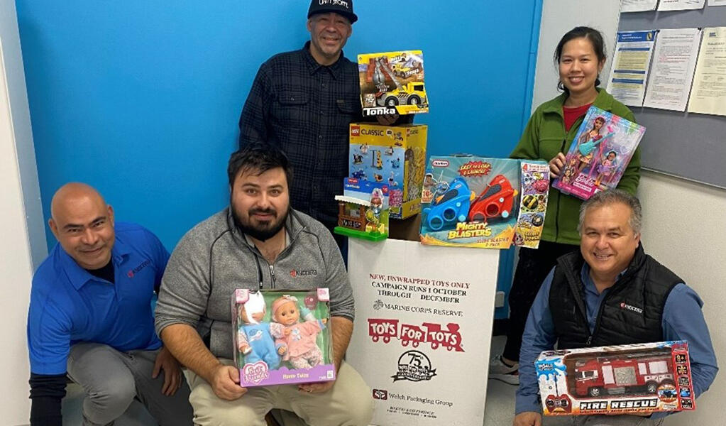 Photo:Donating toys at a community police station